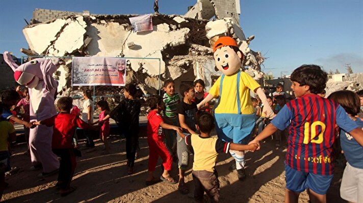 İsrail'in Gazze'ye yönelik son saldırılarında büyük yıkıma maruz kalan Şucaiyye mahallesinde Ramazan ayı nedeniyle çocuklar için etkinlik düzenlendi.