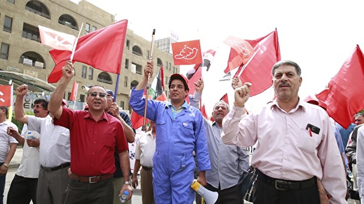 في عيدهم..العمال العراقيون يطالبون بتحسين أوضاعهم