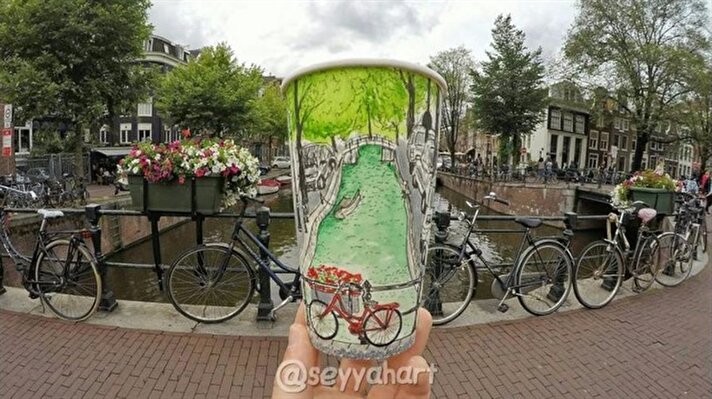 Wanderer draws his travels on coffee cups