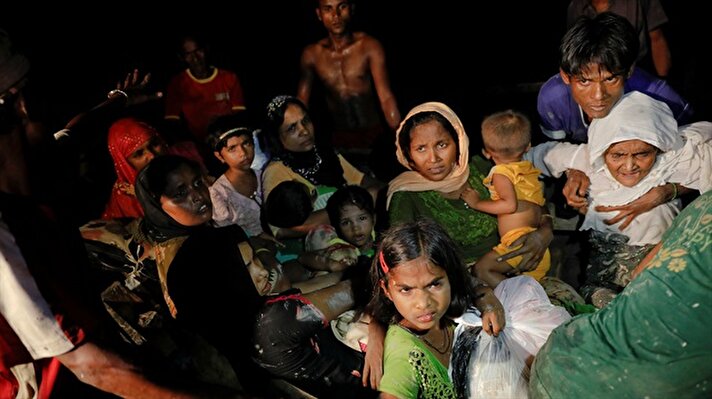 Rohingya travel in the dead of night fearing their lives