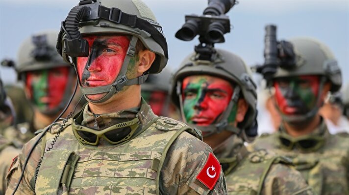 Specialized sergeants with face paint stand at attention after successfully completing the "Counter Terrorism Course" in Izmir, Turkey on November 09, 2017. Total of 837 sergeants completed the course.​