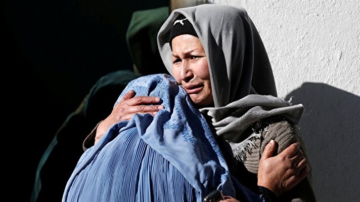 Grieve-stricken Afghans mourn their loved ones after a blast at an office of the Afghan Voice news agency in the capital, Kabul, killed at least 40 and injured 30 more on Thursday. Bereaved relatives gathered at a hospital in Kabul to identify the bodies of those who perished in the attack.