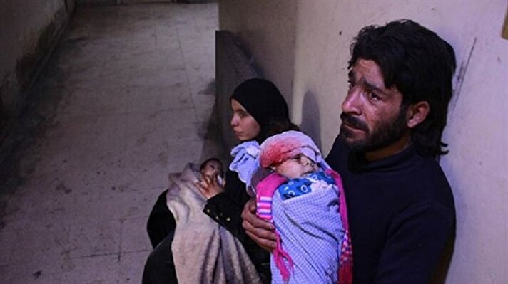  مأساة أهل الغوطة بالصور "ولدي مات جوعًا"