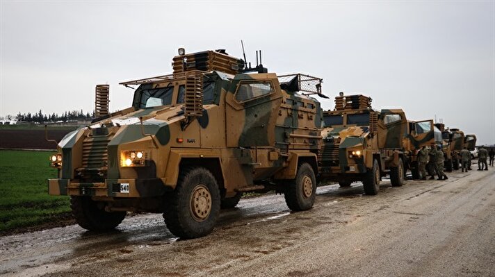 Military vehicles are seen before they move towards to Syrian border as part of the "Operation Olive Branch" in Hatay, Turkey.