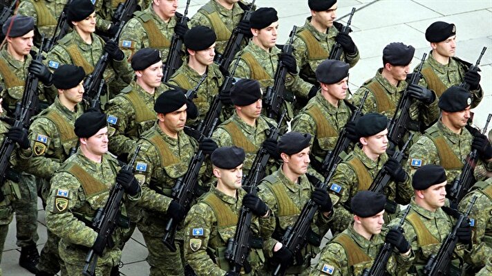 Kosovo security forces parade during celebration of the 10th anniversary of Kosovo's independence in Pristina