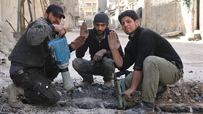 من قلب الحصار والخناق.. سكان الغوطة يطلقون حملة غريبة "أنا عايش"!