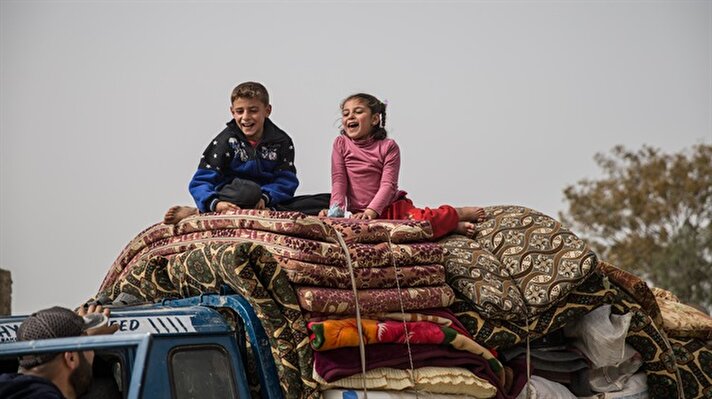  Syrian children are seen on a pick up truck with their family's belongings as they return to their homes Afrin and Idlib, after Turkish Armed Forces and Free Syrian Army (FSA) took complete control of northwestern Syria's Afrin from PKKKCKPYD-YPG and Daesh terror groups within the Operation Olive Branch on March 24, 2018