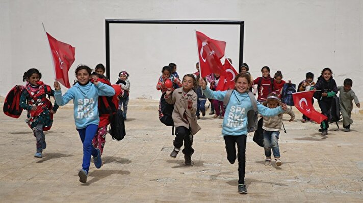 Syrian children return to their school in Afrin