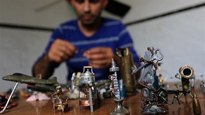 Miniature objects which were made by a 38-year-old Palestinian man Majdi Abu Taqiyya at An-Nasirat refugee camp in Gaza City, Gaza. Palestinian man formed miniature objects by the pieces of the empty bullet cases and gas canisters that had been shot by Israeli forces towards Palestinians during their intervention on the demonstrations, and transform them into works of art. 