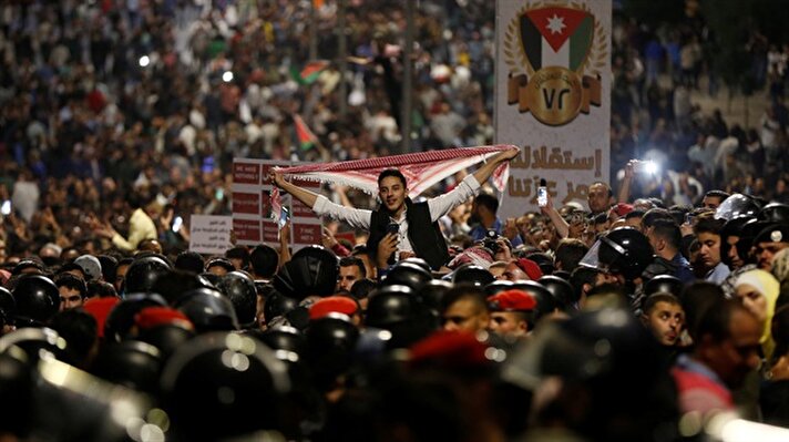 Protesters shout slogans during protest in Amman