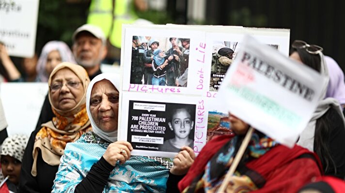 Protesters gather in front of the Israeli consulate general to demonstrate against Israeli violence against Palestinians on Gaza border, Chicago, United States.