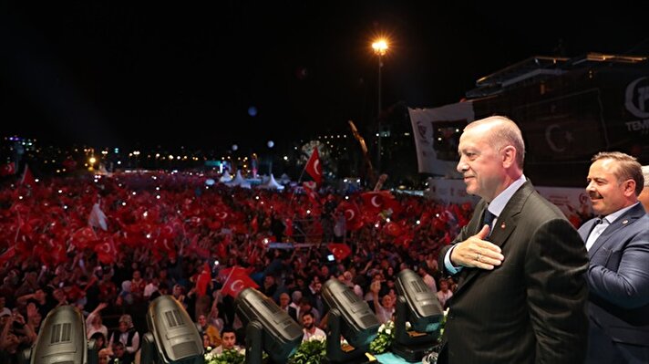 Turkish President Recep Tayyip Erdoğan greets the citizens during July 15 Democracy and National Unity Day event at 15 July Martyrs Bridge to mark July 15 defeated coup's 2nd anniversary in Istanbul, Turkey on July 15, 2018.

