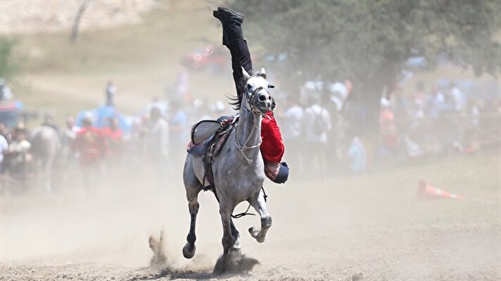 A man competes with his horse during the 3rd Turkish World Ancestors Sports Festival