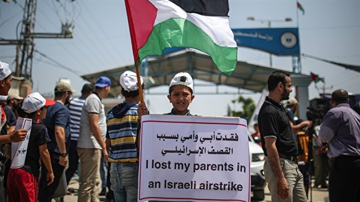 وقفة لأطفال في غزة للمطالبة برفع الحصار الإسرائيلي