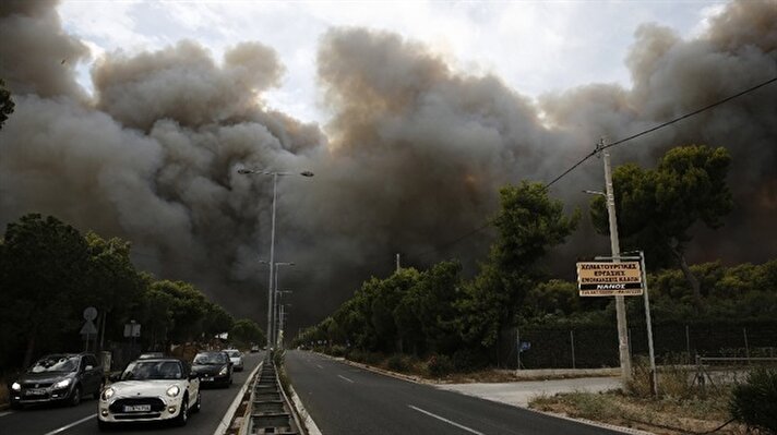 Wildfires ravage Greece’s coastal town of Mati