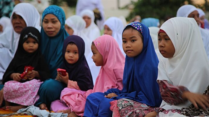 Moro Muslim children are seen during the Eid Al-Adha (Feast of Sacrifice) prayer at the orphanage opened by Turkey's IHH Humanitarian Relief Foundation in Cotabato, Philippines

