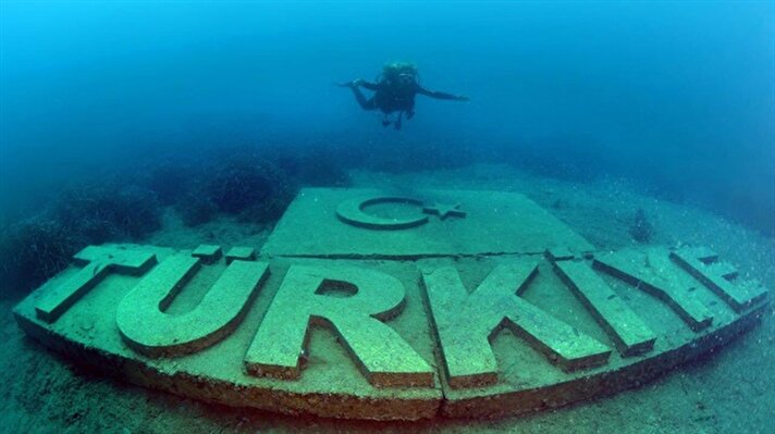 Turkish underwater photographer explores sunken Mediterranean history