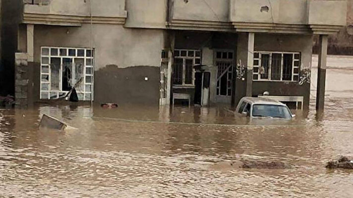 Flash floods in northern Iraq have killed at least nine people, including women and children, and severely damaged thousands of homes, officials said Friday.

