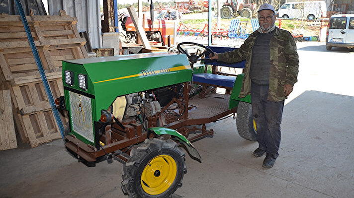  Malkaralı kaynak ustası kendi imkanlarıyla tasarladığı ve 5 bin liraya mal ettiği traktörüyle bahçesinde sürüm yapmaya başladı.