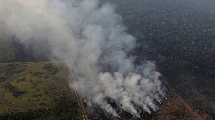 Smoke billows during a fire in an area of the Amazon rainforest near Porto Velho, Rondonia State, Brazil, Brazil August 21, 2019. 

