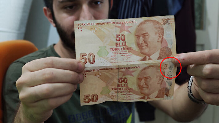 Çanakkale 18 Mart Üniversitesi öğrencisi Doğan Kaya, ATM'den çektiği paralar arasında '0' rakamı bulunmayan 50 liralık banknotu görünce önce sahte olduğunu düşündü. 