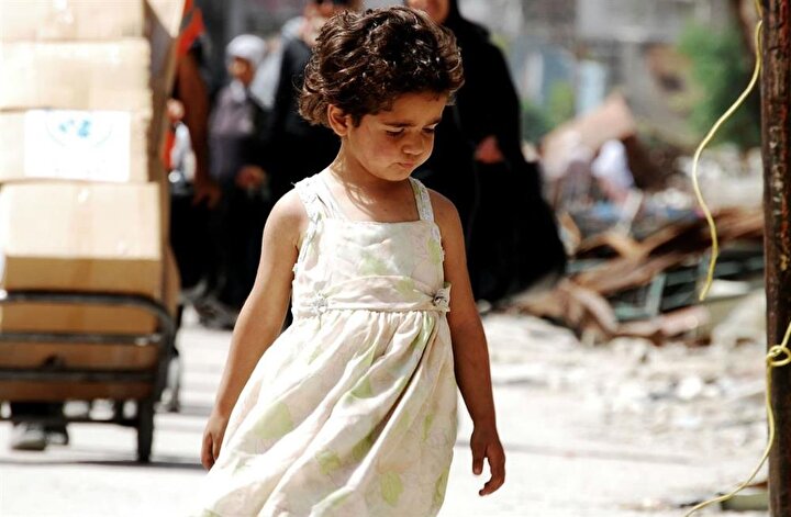 Doğuştan mülteci olan Yermüklü çocuklar, Esed güçlerinin kuşatması altında büyüyorlardı. (Fotoğraf: Niraz Said)