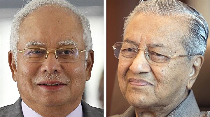 Mahathir Muhammed (sağda), 9 Mayıs'taki seçimlerde Razak'ı devirdi.