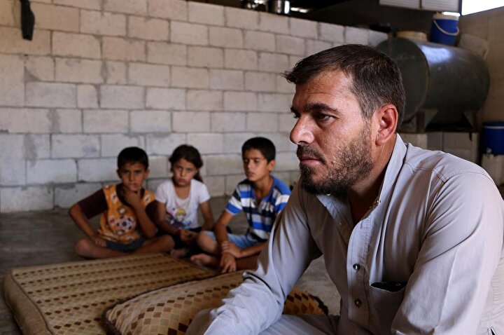 Muhib Kaddur, bölgede yaşayan çocukların savaşın yanı sıra hastalıkların da tehdidi altında olduğuna dikkat çekiyor. (Muhammed Abdullah / AA)