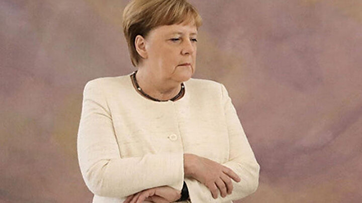 Angela Merkel yine titredi