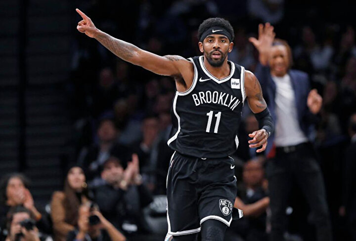 Kyrie Irving yeni takımıyla ilk maçında 50 sayı üretti.