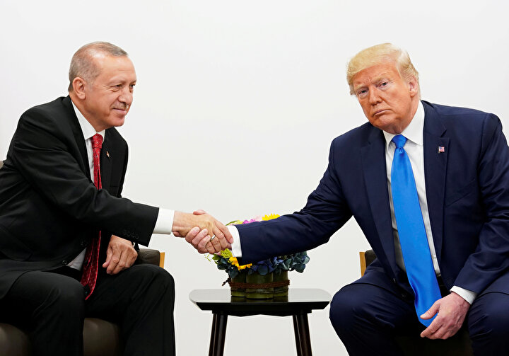 Cumhurbaşkanı Recep Tayyip Erdoğan ve ABD Başkanı Donald Trump G-20 Liderler Zirvesi'nde görünüyor.