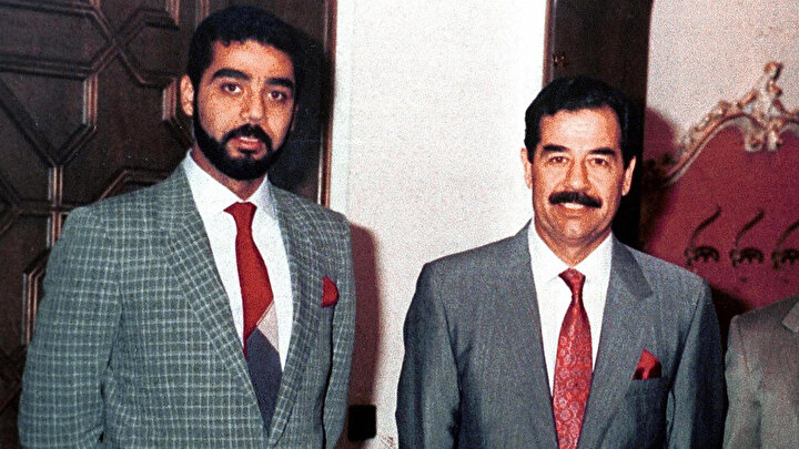 Saddam Hüseyin, oğlu Uday ile birlikte.