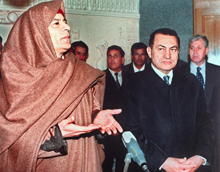 Mübarek, Muammer Kaddafi'yle 1996.