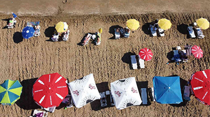 Çinliler bile geliyor: Hava sıcaklığı 33 dereceyi buldu, tatilciler Kızkalesi’ne akın etti