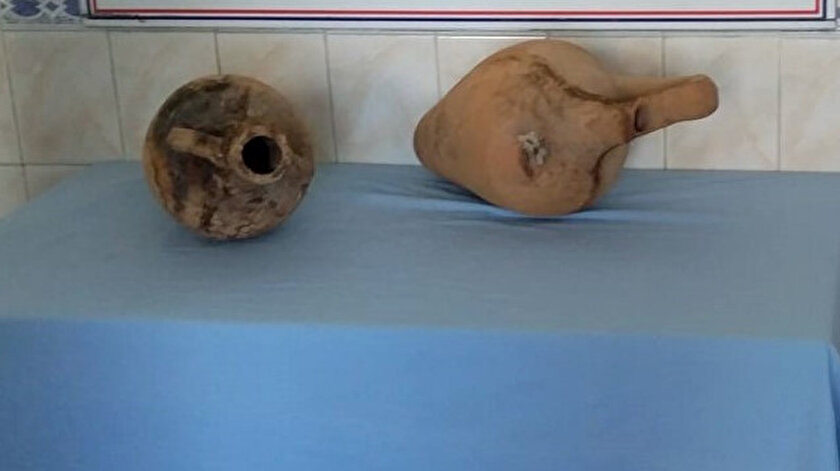 Ağa takılan amforalar.