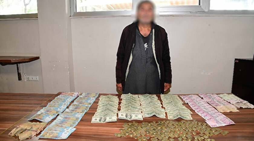 Dilencinin üzerinden çıkan paralar.