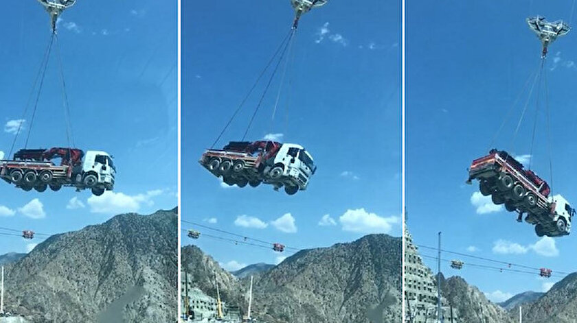 Taşıma sırasında meydana gelen tonlarca ağırlıktaki iş makinesinin sallanması ilginç görüntülerin yaşanmasına neden oldu.