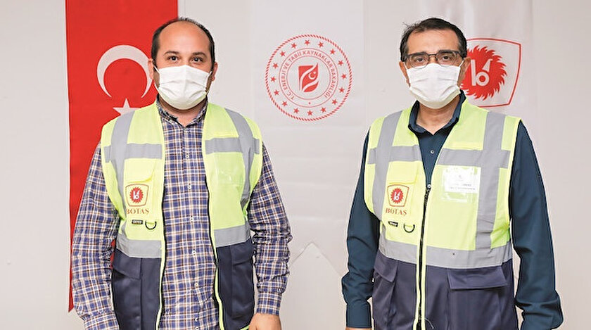 Enerji ve Tabii Kaynaklar Bakanı Fatih Dönmez (Sağda)