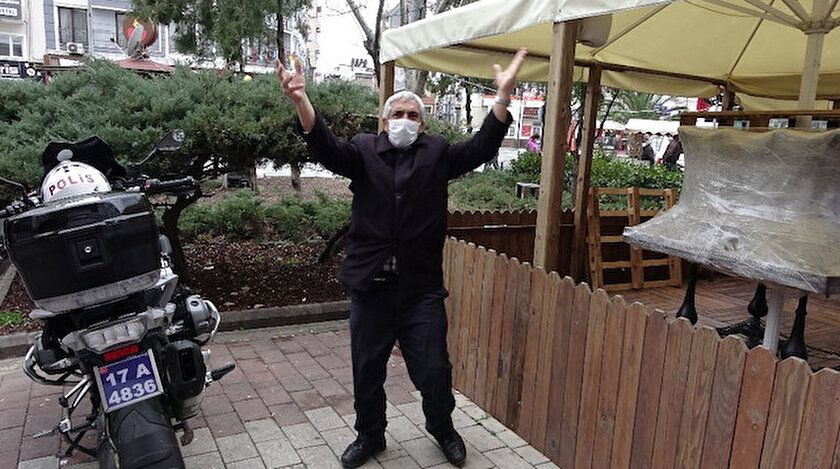 Banka önünde karantinaya alınan şahıs, sağlık ekipleri tarafından evine götürüldü.
