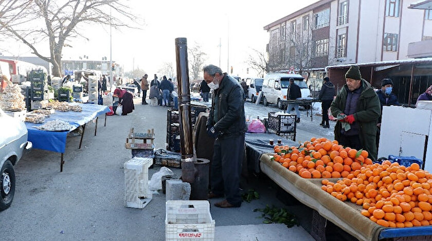 Pazarcıların soğukla imtihanı: Soba kurup ısındılar