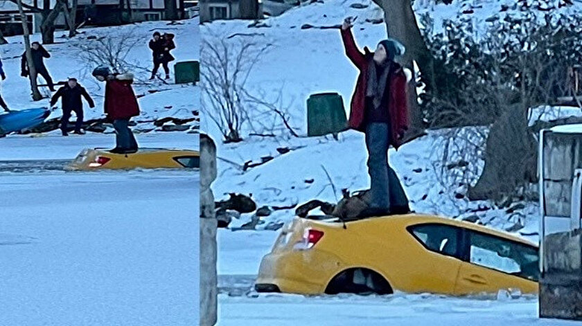 Otomobili sulara gömülürken selfie çekti