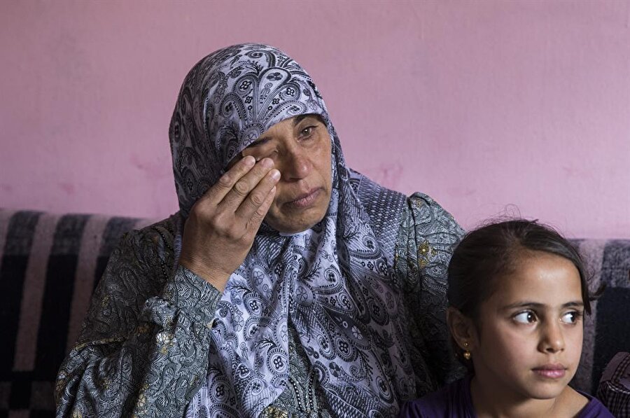 Meryem El Nayf, öldürülen oğlunun iki çocuğuna gözü gibi bakıyor. (Mustafa Kamacı / AA)