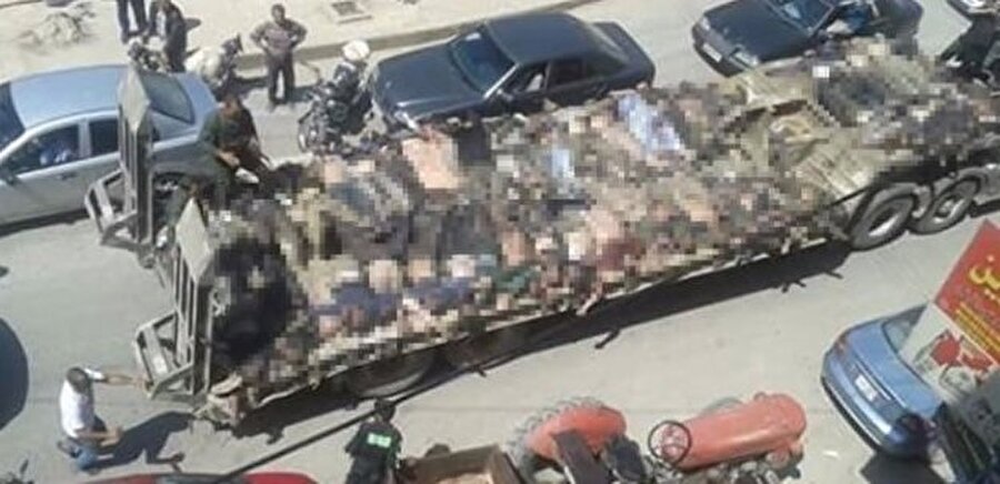 Örgüt militanları hayatını kaybeden bir grup yerel ÖSO mensubunun cesedini araç konvoyuyla Afrin caddelerinde teşhir etmişti.