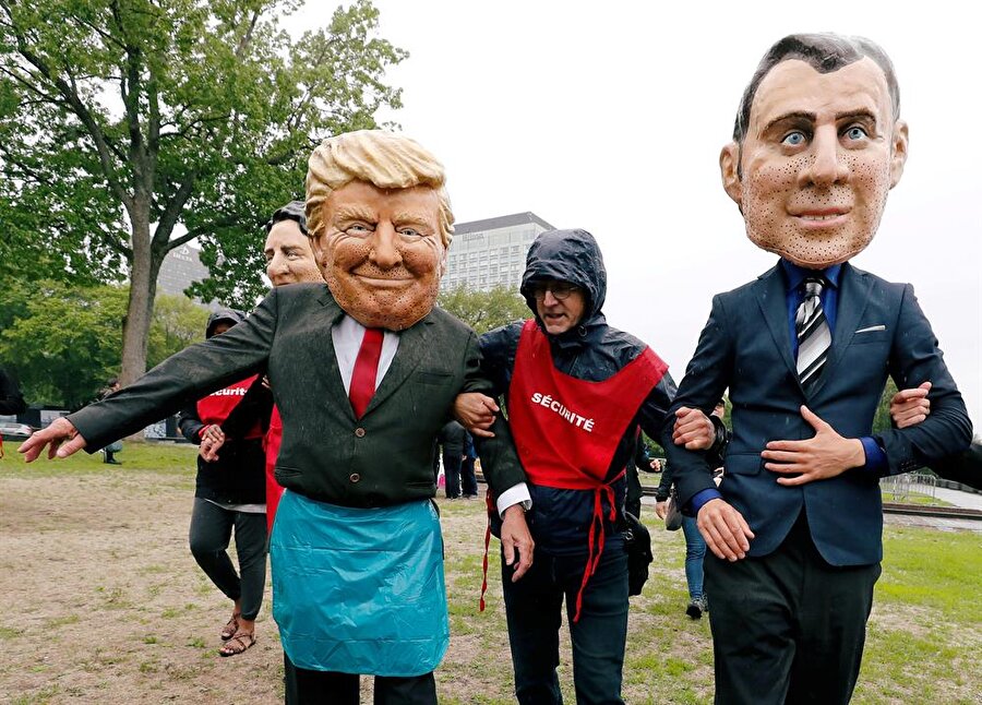 G7 Zirvesi Kanada'da Quebec City'deki G7 liderlerinin maskesi takılarak bir grup aktivist tarafından protesto edildi.