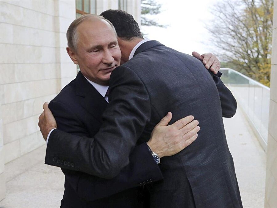 Putin'in, Suriye Devlet Başkanı Beşşar Esed'i Soçi'deki kabulünden bir kare.