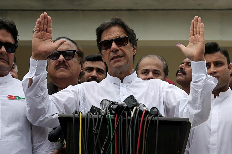 Pakistan'da 25 Temmuz'da düzenlenen seçimi İmran Han liderliğindeki PTI kazanmıştı. (Athıt Perawongmetha / Reuters)