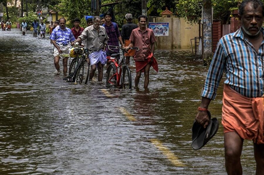 Hindistan'ın güney Kerala eyaleti, yaklaşık 1.5 yıldır yoğun muson yağmurlarından dolayı sel felaketlerine maruz kaldı. Fotoğraf: The Verge.