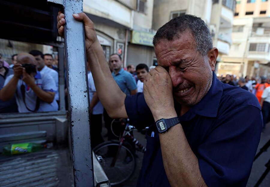 İşini kaybeden Gazzeliler büyük üzüntü yaşadı. (Ibraheem Abu Mustafa / Reuters)