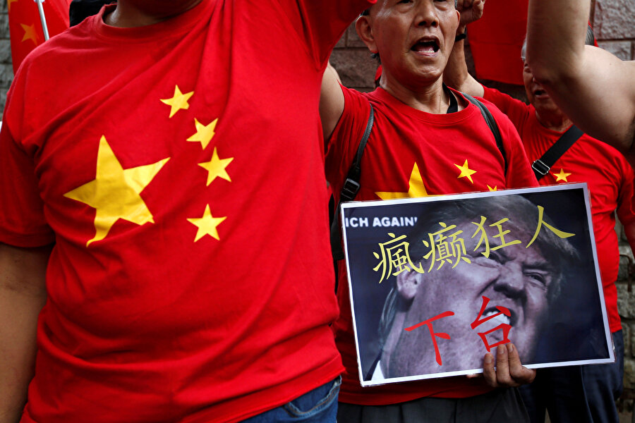 Çinli vatandaşlar, ABD Başkanı Trump'ı protesto etmişlerdi.