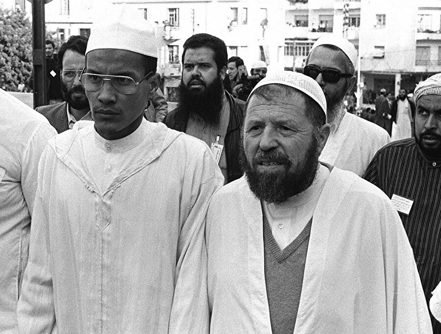 Abbasi Medeni ve yardımcısı Ali Belhac (solda)